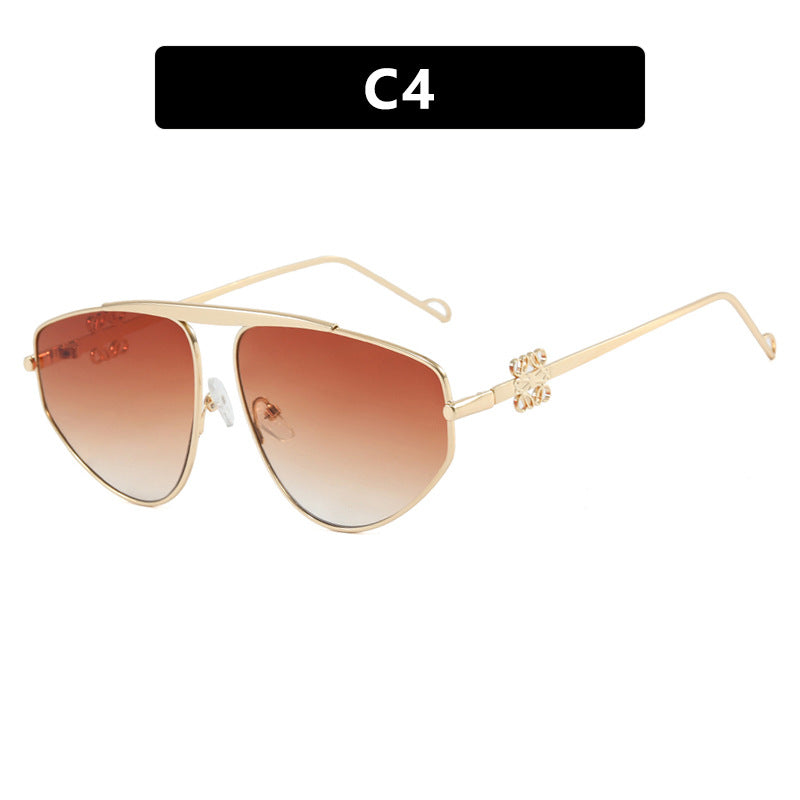 Einstrahlige, unregelmäßige Sonnenbrille, Metall-Kröten-Hohlsonnenbrille, europäische und amerikanische UV-beständige Sonnenbrille, konkaves Design für Damen