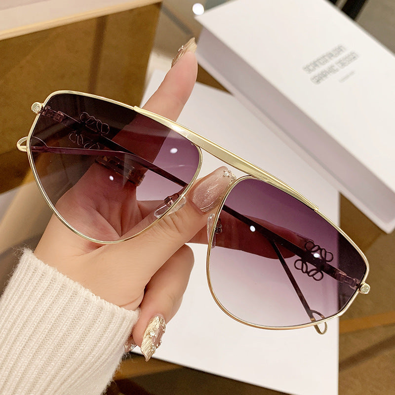 Einstrahlige, unregelmäßige Sonnenbrille, Metall-Kröten-Hohlsonnenbrille, europäische und amerikanische UV-beständige Sonnenbrille, konkaves Design für Damen