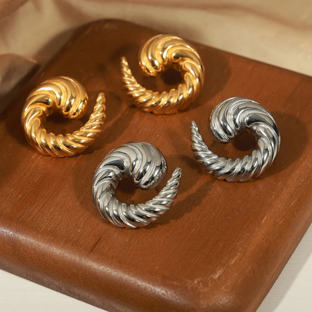 Spiralförmige Ohrstecker aus Titanstahl