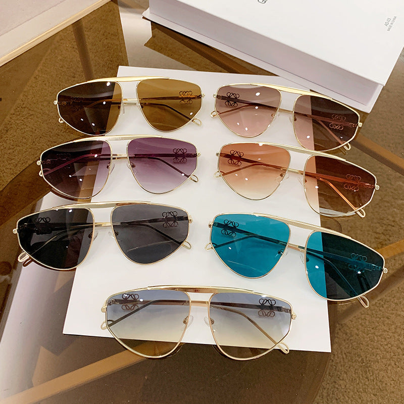 Einstrahlige, unregelmäßige Sonnenbrille, Metall-Kröten-Hohlsonnenbrille, europäische und amerikanische UV-beständige Sonnenbrille, konkaves Design für Damen