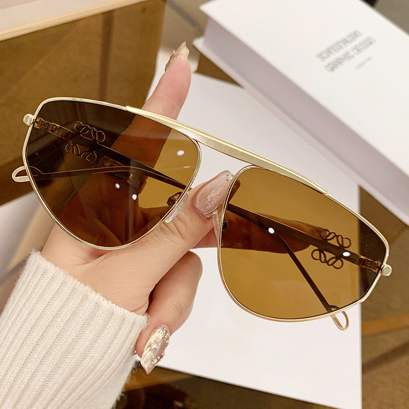 Einstrahlige, unregelmäßige Sonnenbrille, Metall-Kröten-Hohlsonnenbrille, europäische und amerikanische UV-beständige Sonnenbrille, konkaves Design für Damen